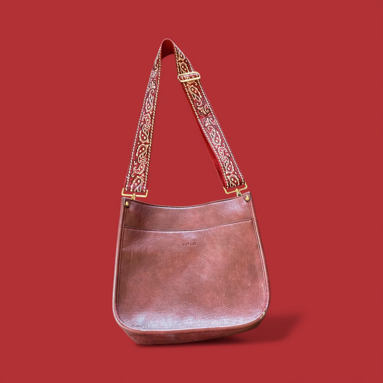 Hand bag with vintage strap
