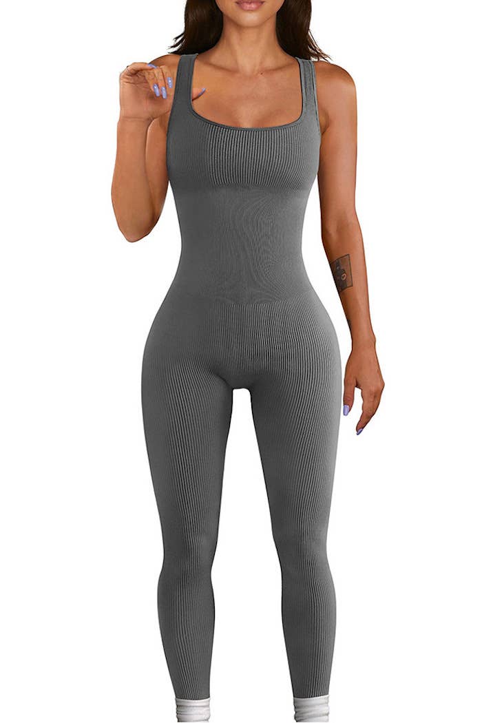 Solid black color seamless ribbed fitted style body jumpsuit: Black