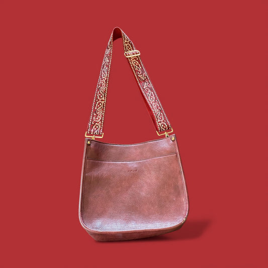 Hand bag with vintage strap
