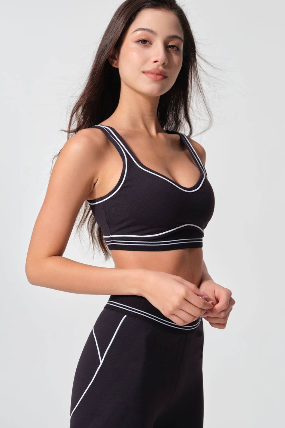 Premium sports bra with matching white trim line legging set: Black